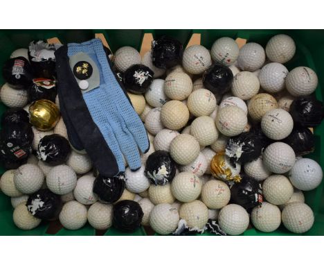 A quantity of vintage golf balls, some unused and wrapped, including Dunlop 65, Uniroyal Plus 6, etc