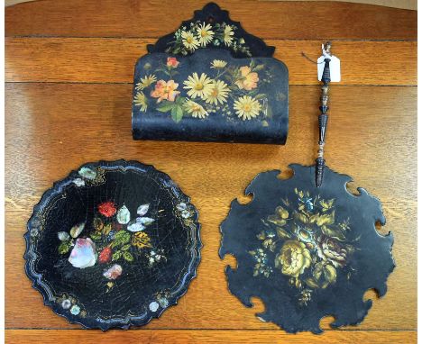 A Victorian paper mache firescreen fan, painted and applied with flowers, turned handle; another, inlaid with mother of pearl