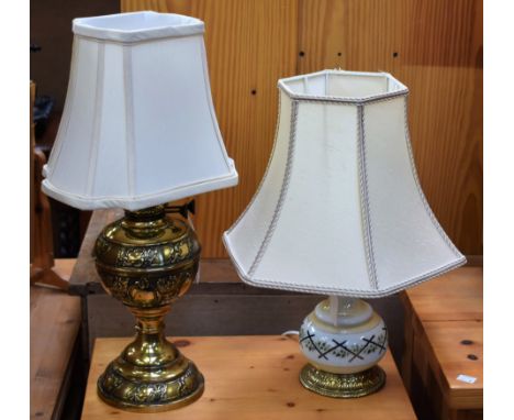 A 20th century brass Duplex oil lamp, later converted to electricity; another similar (2)
