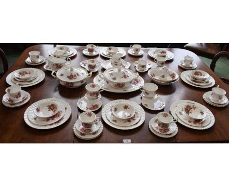 A Royal Albert Centennial Rose pattern part dinner and tea set, comprising dinner plates, salad plates, side plates, dessert 