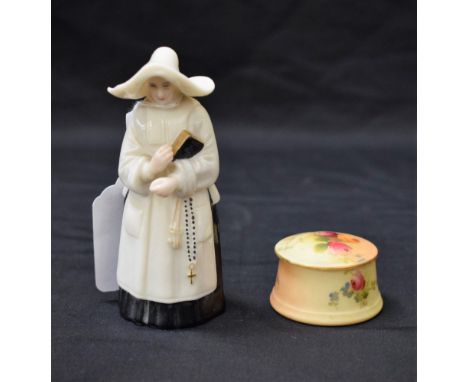 A miniature Royal Worcester circular box and cover; a Royal Worcester candle snuffer, as a Nun (2)