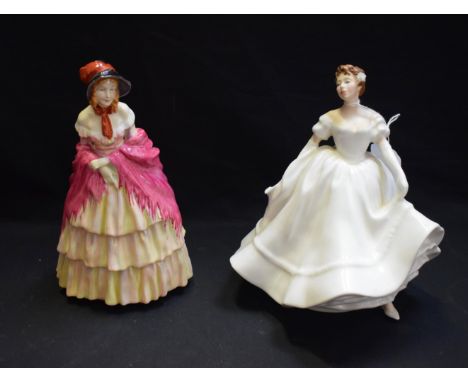A Royal Doulton ceramic figure, A Victorian Lady, HN727; another, Nancy, HN2955 (2)