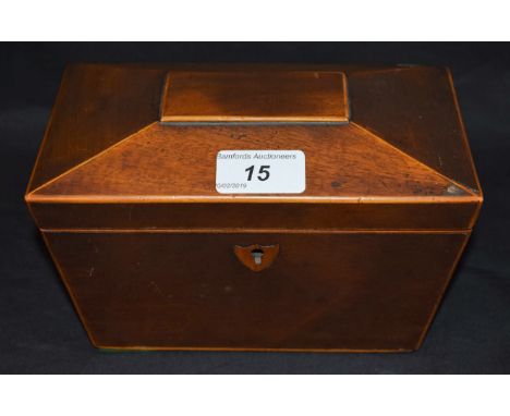 A George IV mahogany sarcophagus tea caddy, outlined throughout with boxwood stringing, shield shaped cartouche, 19.5cm wide,