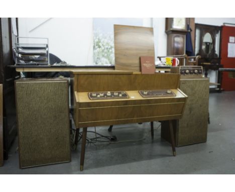 LEAK 'VARISLOPE STEREO' RADIOGRAM, with trough-line II radio received in walnutwood case and having Garrard Model 301-turntab