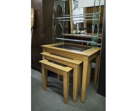 A NEST OF THREE LIGHT OAK OBLONG COFFEE TABLES, WITH INSET PLATE GLASS TOPS 