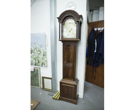 A REPRODUCTION MAHOGANY CASED LONGCASE CLOCK, the arched brass dial dated 1981 