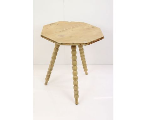 Victorian Pine Cricket type Table, the octagonal top raised on three bobbin legs, 53cm wide x 59cm high 