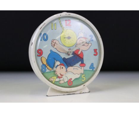 Mid 20th Century Smiths Popeye Alarm Clock, with cream enamel case, measures 11cm W x 12cm H
