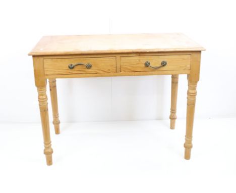 19th century Pine Side Table with two drawers raised on turned legs, 91cm long x 50cm deep x 68cm high 