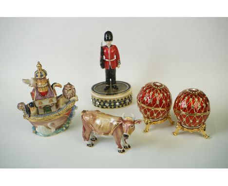 A collection of five decorative enamel trinket boxes. 