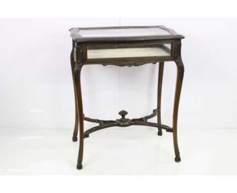 Early 20th century Bijouterie Table, the hinged lid opening to a velvet lined interior, raised on carved cabriole legs united
