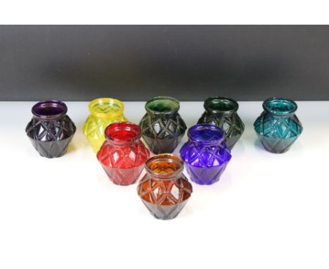 Set of Eight Victorian Moulded Glass Tea Light Holders of varying colours, with geometric diamond-shaped design, approx 8.5cm