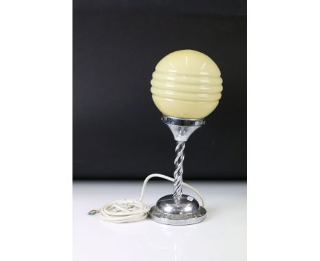 Art Deco Chrome Table Lamp with pale yellow ribbed glass shade above a spiral twist support, with circular floral-decorated f