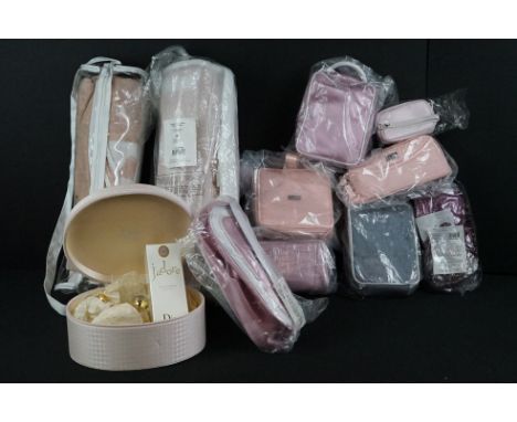 A collection of make up bags, boxes..etc.. mostly Christian Dior examples with contents, most factory sealed.