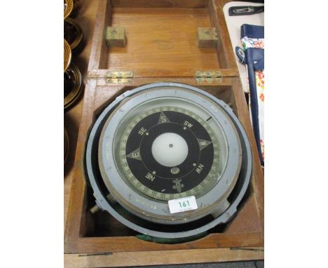A WW2 military gimbal compass in corresponding box, patent no 0195A, number 7777.HS, marked 51A with broad arrow.