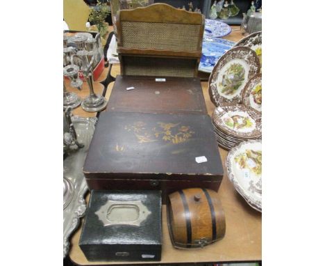 An early 20th century jewellery case with handle, a circa 1930s wooden box in the form of a barrel, A lacquered box having or