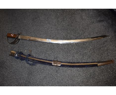 A decorative vintage sword having blue velvet to scabbard and engraved blade.