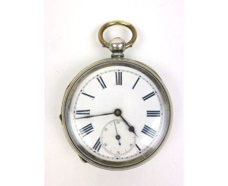 A silver cased open face pocket watch, the white enamel dial with black Roman numerals and second hand section within an engi