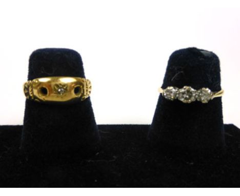 An 18ct yellow gold ring set three graduated diamonds, ring size L, 1.6 gms, together with an 18ct yellow gold ring set singl