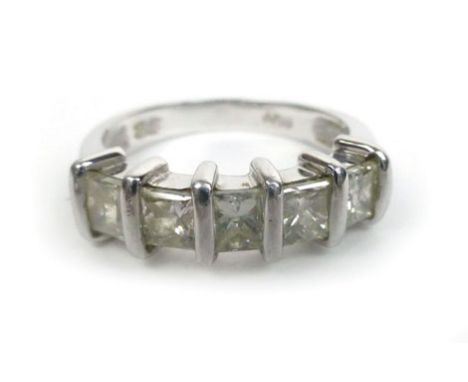 A platinum ring set a single row of five princess cut diamonds, ring size O, 6.2 gms