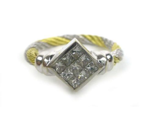 A 14ct two colour gold ring set nine princess cut diamonds within a square setting on a ropetwist shank, ring size O/P, 5.6 g