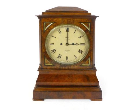 A late Victorian bracket clock by Dent, the twin fusee movement within a figured walnut, foliate fretwork and brass mounted c