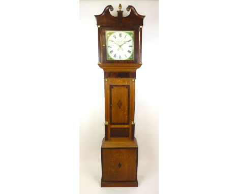 An 18th century and later oak, mahogany and rosewood longcase clock, the swan neck pediment above an enamelled face with Roma