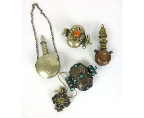 A collection of Tibetan metalware to include a miniature white metal flask, white metal and turquoise pouch and two other ite