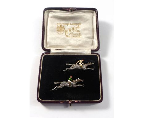 A pair of early 20th century yellow and white gold brooches, each in the form of a jockey 'up', pave set with diamonds and en