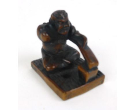 A Japanese Meiji period carved wooden netsuke, h. 4cm