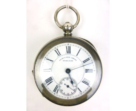 A silver cased open face pocket watch by Henry E. Peck, London, the white enamel dial with black Roman numerals and second ha