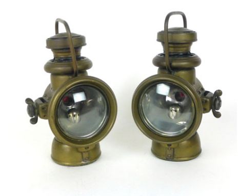 A pair of P&H Birmingham oil burning vehicle lamps, both marked No. 540, with domed lens, loop handles and ruby glass tell-ta