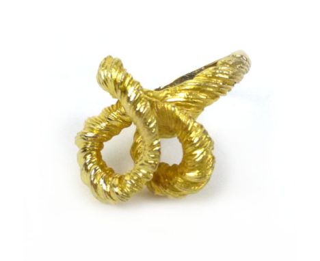 A modern 9ct yellow gold ring of knotted design, maker CJ Ltd., ring size R/S, 8.1 gms 