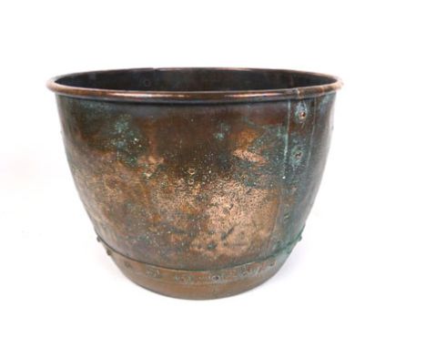 A 19th century brass log basket, with embossed diamond decoration enclosing rivets, h. 33 cm, dia. 47 cm CONDITION REPORT: Pa