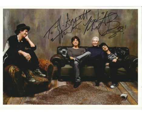  Stunning 8x12 photograph of legendary rock band The Rolling Stones personally autographed by drummer Charlie Watts. He has d