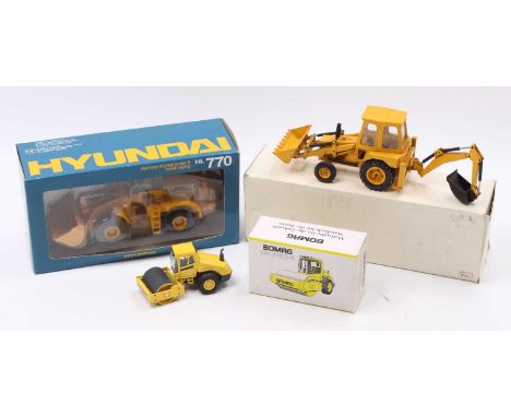 A collection of three various mixed construction vehicles to include a Bomag No. 1 1/50 scale EW213 roller, a Hyundai Heavy I