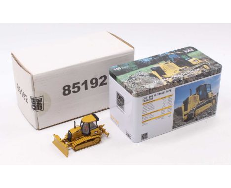 A Diecast Masters 1/50 scale No. 85192 model of a Caterpillar D6K XL track type tractor, housed in the original tin box, and 