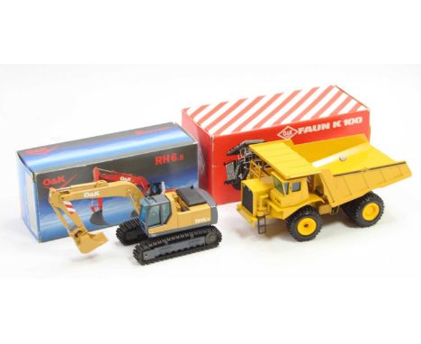 An NZG and Gama 1/50 scale O&amp;K boxed construction vehicle group to include an O&amp;K No. 469 RH6.5 wheeled excavator fin