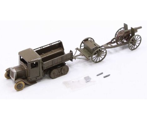 A Britains No.1433 Army covered lorry, comprising of a military green body with rear caterpillar style tracks and white front
