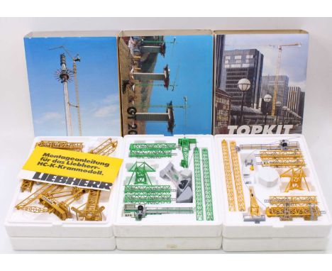 A Conrad 1/87 scale tower crane boxed group to include a No. 2011 Potain Top Kit MD Matic Tower Crane, a No. 2013A BPR Cadill