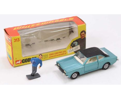 Corgi Toys No. 313, Ford Cortina in light blue complete with Graham Hill figure in near mint condition, comes in the original