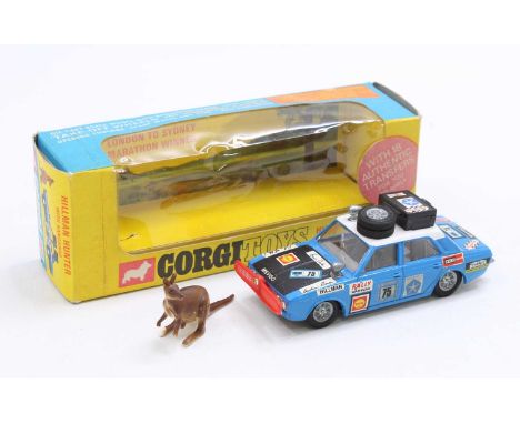 Corgi Toys No. 302 Hillman Hunter Rally Car, blue body with white roof, matt bonnet, RN75, with equipment to roof, in the ori