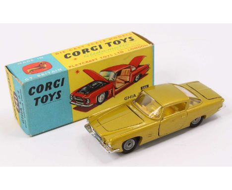 Corgi Toys No. 241 Chrysler Ghia L64 comprising of gold body with yellow interior and cast hubs, rare example, housed in the 