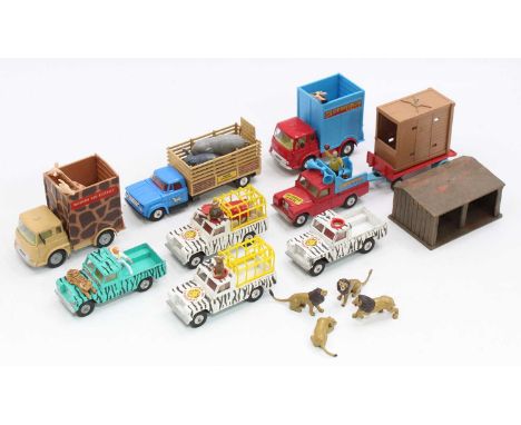 A Corgi Toys Safari and Circus model group, with examples to include a Dodge Kew Fargo, Bedford Giraffe Transporter, and Land