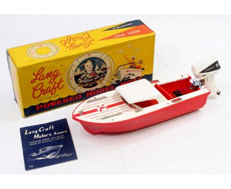 A Lang Craft No. L-303 battery operated model speed boat comprising of red and white plastic body with Lang Craft motor, hous