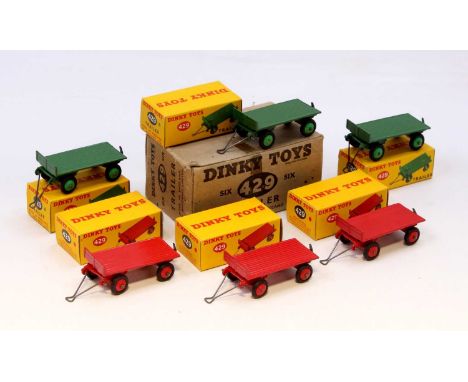 A Dinky Toys No. 429 trade box of six four-wheel trailers, all housed in original individual card boxes, and the outer buff c