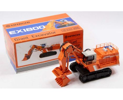 A Shinsei 1/60 scale model of a Hitachi EX1800 Giant excavator, housed in the original polystyrene and card box