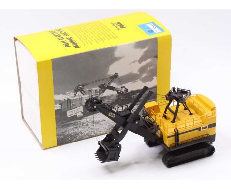 A Conrad No. 2940 1/87th scale diecast model of a P&amp;H electric mining shovel, finished in yellow and black, and housed in