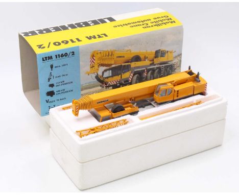 A Conrad No. 2090 1/50 scale model of a Liebherr LTM 1160/2 mobile crane, finished in orange and housed in the original polys