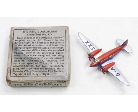 A Dinky Toys No. 62K The King's Aeroplane Air Speed Envoy finished in silver, red and blue, in the original blue lift-off lid